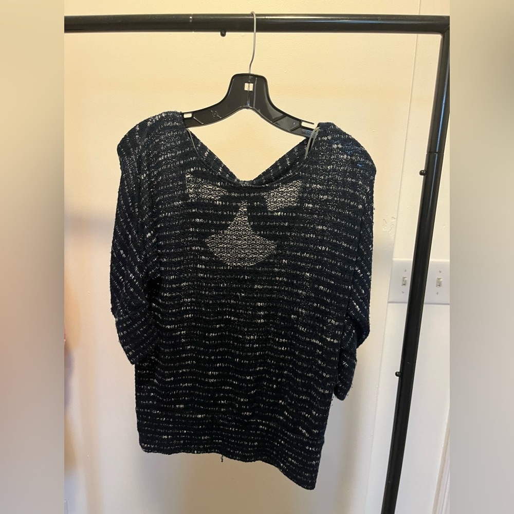 A Byer navy blue sweater with bow back